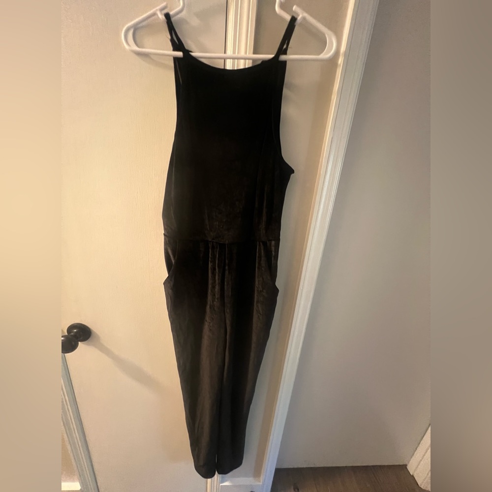 Black velvet jumpsuit from Urban Outfitters
